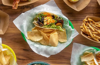 Overhead photo of food spread on table at Jimmy Hulas
