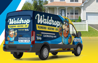 Photo of Waldrop Plumbing, Heating, and Air service van in front of residential home